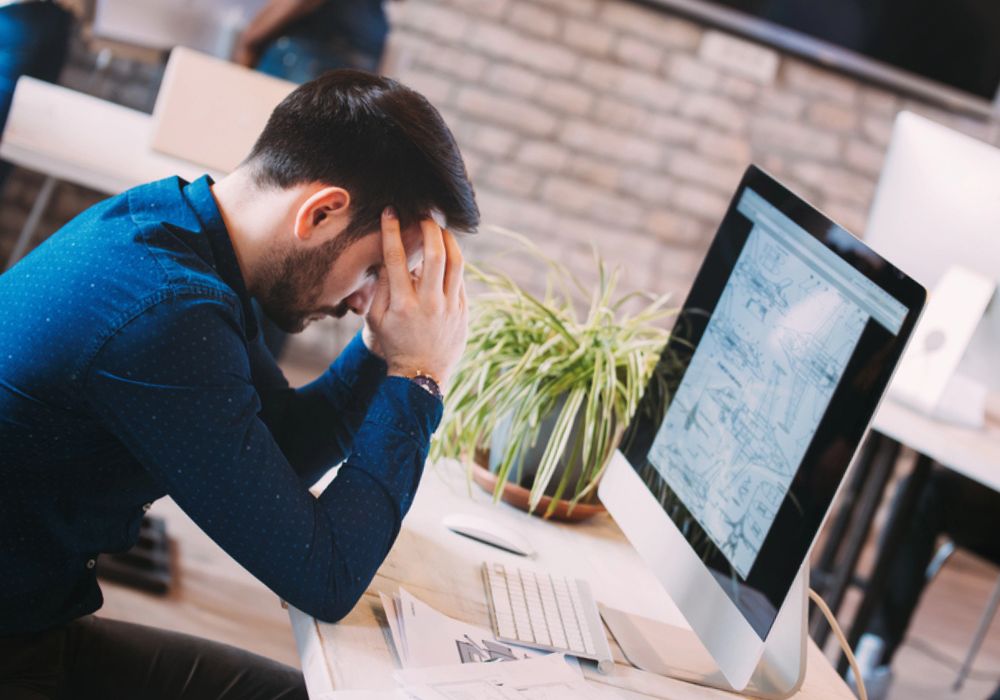 A man frustrated at website forms broken and not working correctly
